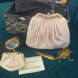 Judith Leiber soft pink satin clutch. Brand new! Certificate of authenticity.